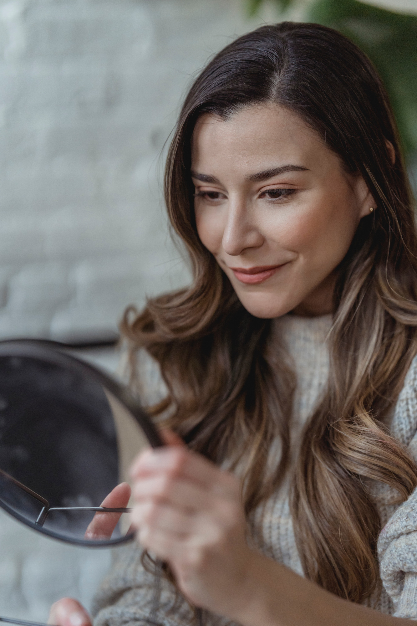 Hair and scalp consultation for a woman experiencing hair thinning