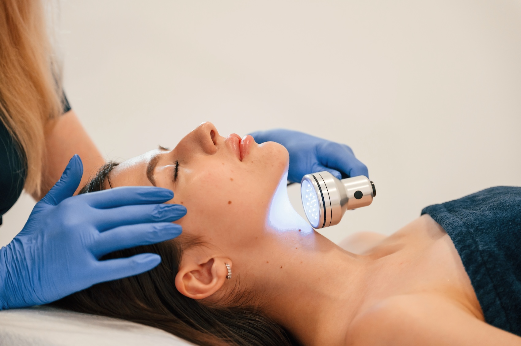 Patient receiving a laser skin treatment at Physician Aesthetic Specialists