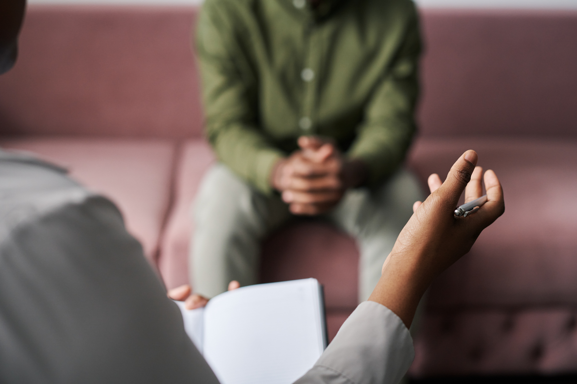 Male patient discussing sexual wellness concerns with a medical provider