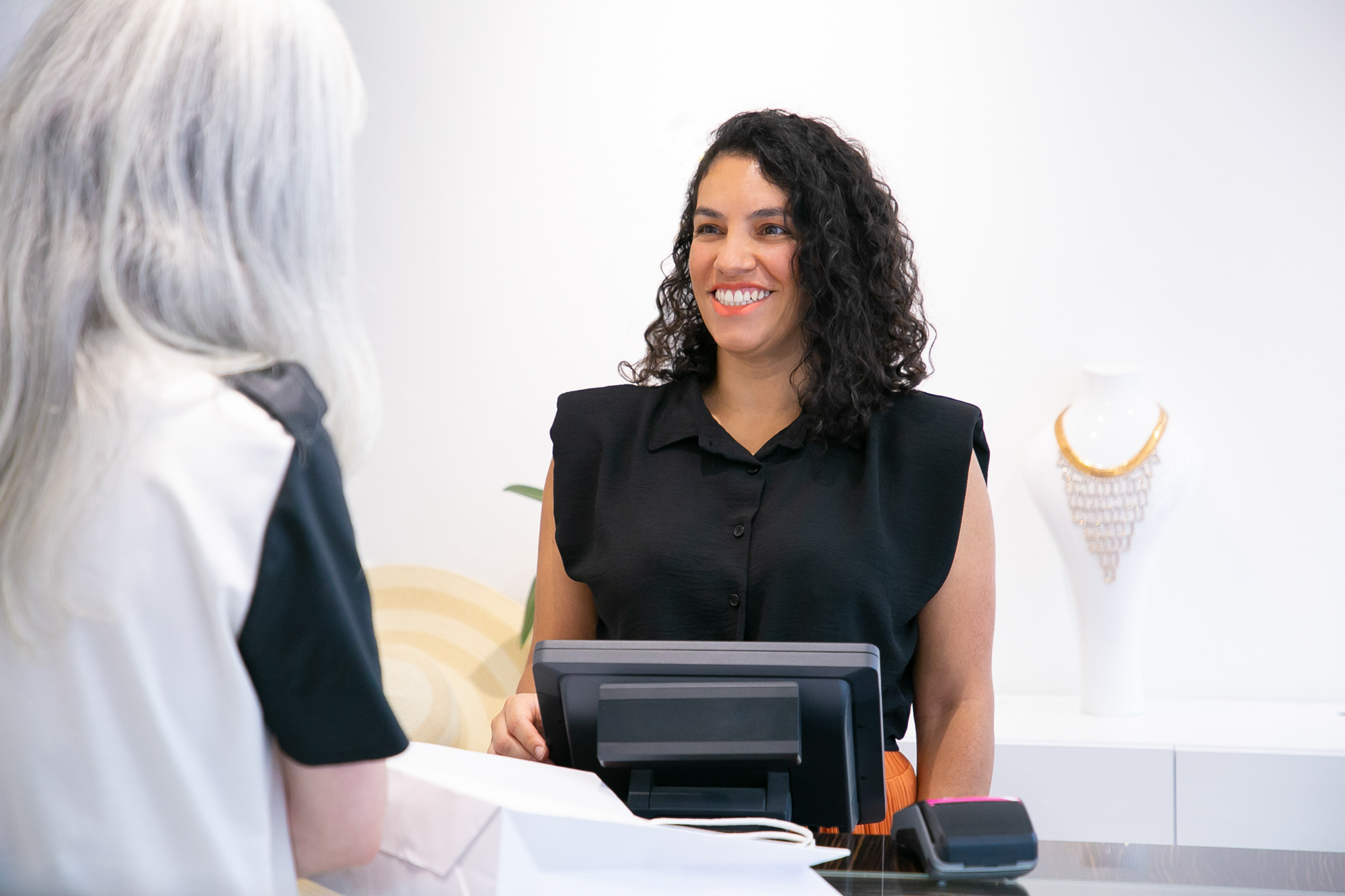 A patients listens to a provider explain Urinary Incontinence Treatment in Lenexa